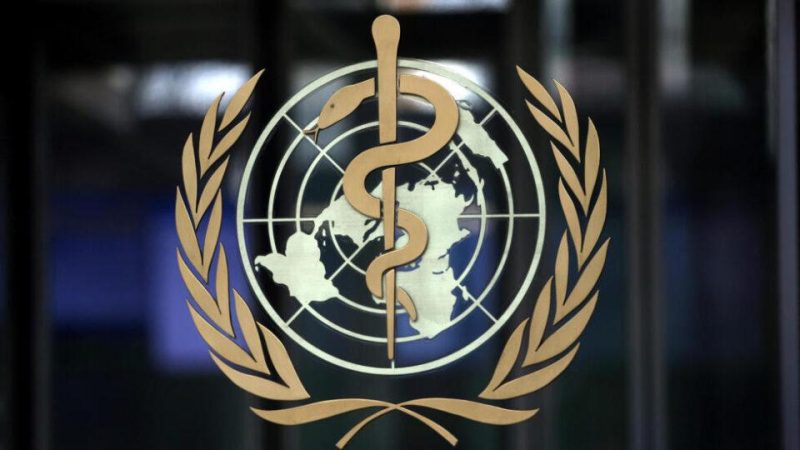 FILE PHOTO: FILE PHOTO: A logo is pictured on the headquarters of the WHO in Geneva | MCG24 | موقع إلكتروني مغربي شامل متجدد على مدار الساعة