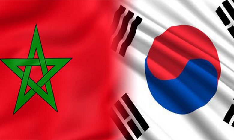 84593785-60392924 | MCG24 | موقع إلكتروني مغربي شامل متجدد على مدار الساعة Two national flags side by side: Morocco on the left (red field with a green pentagram) and South Korea on the right (white field with red-blue circle and black trigrams).