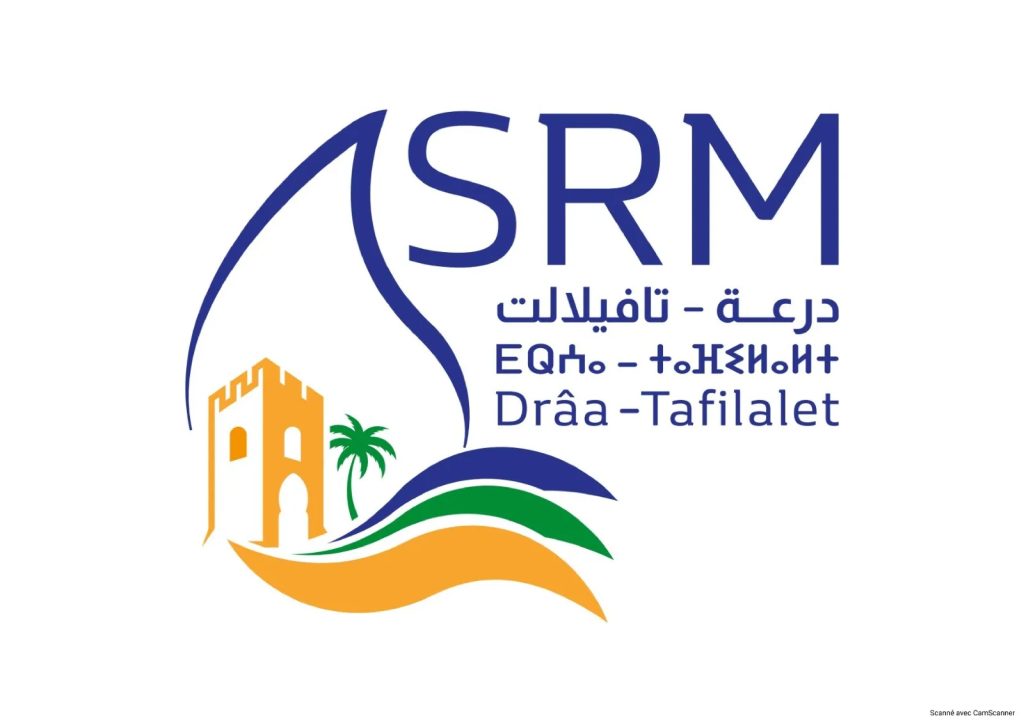 Premiere-reunion-du-Conseil-SRM-Draa-Tafilalet-a-Errachidia-hdj-1 | MCG24 | موقع إلكتروني مغربي شامل متجدد على مدار الساعة ASRM logo with large blue letters and Arabic text, featuring a palm tree, orange castle, and multicolored waves forming a coastal scene