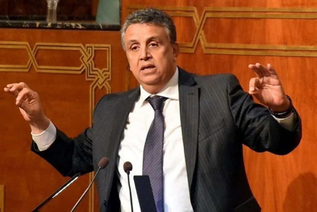 abdellatif_ouahbi_ministre_justice_1558110502_fa1677f0aa | MCG24 | موقع إلكتروني مغربي شامل متجدد على مدار الساعة Man in a dark pinstripe suit giving a speech at a podium with two microphones, gesturing with his hands.