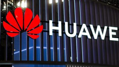 Huawei brand logo: red flower emblem beside the word HUAWEI on a blue striped background