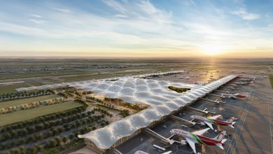 WhatsApp-Image-2025-03-20-at-104003 | MCG24 | موقع إلكتروني مغربي شامل متجدد على مدار الساعة Sunset at a modern airport with a wavy, perforated roof over the gates and numerous parked airplanes lined up at the jetways