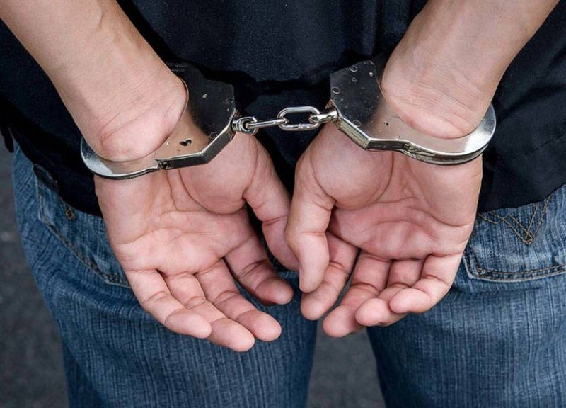 توقيف-1 | MCG24 | موقع إلكتروني مغربي شامل متجدد على مدار الساعة Back view of a person with hands cuffed behind their back in metal handcuffs