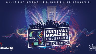 Festival Mawazine poster showing a cheering crowd, neon cityscape, and the dates June 19–27, 2026.
