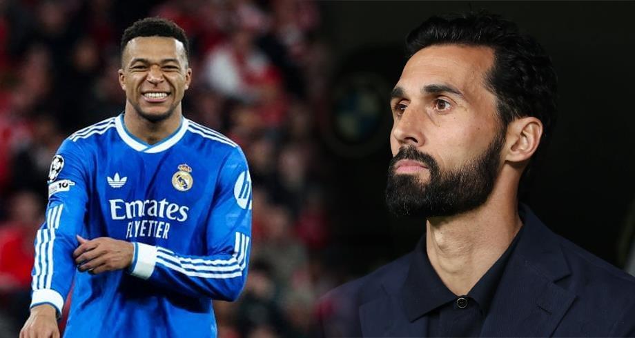 Two men side by side: left is a Real Madrid footballer in a blue kit smiling, right is a bearded man in a dark suit looking away.