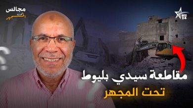 Smiling man in foreground with construction site and Arabic headline text in the background.