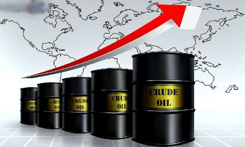 Series of black crude oil barrels with a red upward arrow and world map background, indicating rising oil prices or demand.