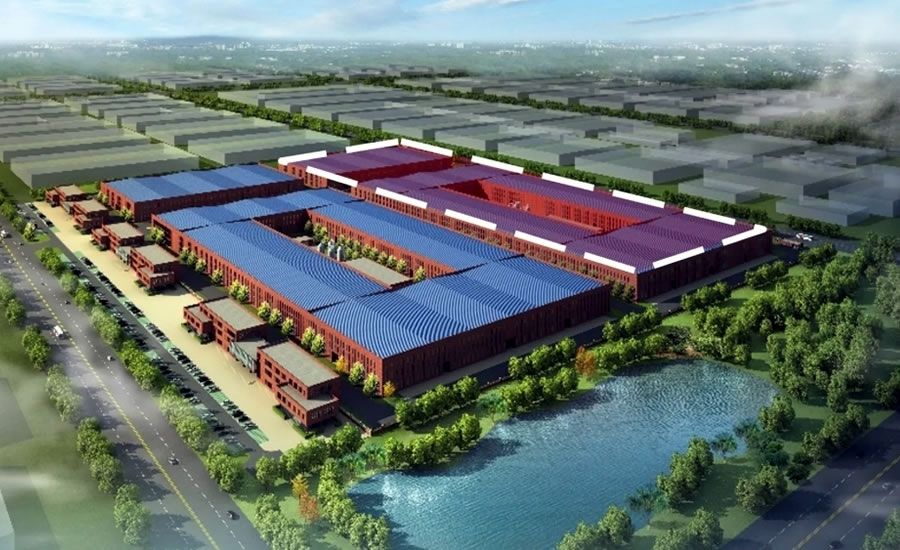 Aerial rendering of a large factory complex with blue and purple roofs, inner courtyards, and surrounding trees near a pond and roads.