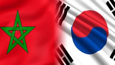 Two national flags side by side: Morocco on the left (red field with a green pentagram) and South Korea on the right (white field with red-blue circle and black trigrams).