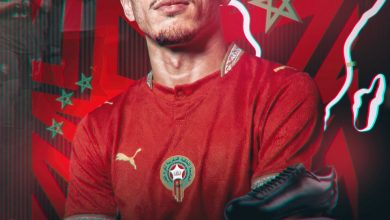 Portrait of Zakaria El Ouahdi in a red jersey, with a neon-outline map of Morocco and award graphics in the background for the Soulier d'Ebene African Awards