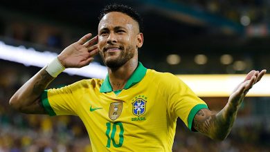 IMG_6307 | MCG24 | موقع إلكتروني مغربي شامل متجدد على مدار الساعة Brazilian soccer player wearing Brazil's yellow jersey with number 10, cupping his ear in celebration.