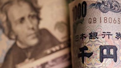 IZVAQCWRJE | MCG24 | موقع إلكتروني مغربي شامل متجدد على مدار الساعة Close-up of a Japanese 1,000-yen banknote, showing the portrait on the left and the large 円 character on the right with decorative patterns.
