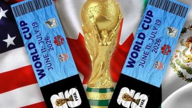 jojpo | MCG24 | موقع إلكتروني مغربي شامل متجدد على مدار الساعة World Cup 2026 tickets beside the golden FIFA World Cup trophy with flags in the background (June 11–July 19, 2026).