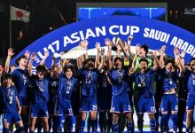 qna_japan_22_5_2026 | MCG24 | موقع إلكتروني مغربي شامل متجدد على مدار الساعة U17 Asian Cup winners, a blue-clad youth soccer team celebrate with trophy and medals.