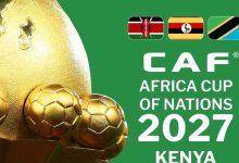 vis_0516202617462585 | MCG24 | موقع إلكتروني مغربي شامل متجدد على مدار الساعة CAF Africa Cup of Nations 2027 poster with a golden trophy and Kenya branding on a green background, featuring small flag icons.