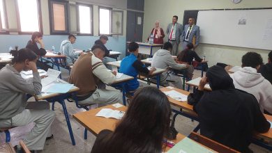 FB_IMG_1780303892959 | MCG24 | موقع إلكتروني مغربي شامل متجدد على مدار الساعة Classroom scene with students at desks taking notes while three instructors stand at the front near a whiteboard; one woman in a headscarf among them.