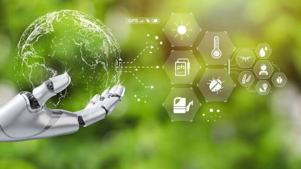 IMG-20250310-WA0000-1280x720 | MCG24 | موقع إلكتروني مغربي شامل متجدد على مدار الساعة Robotic hand holding a glowing globe with eco-tech hexagon icons around it, symbolizing sustainable technology and AI.