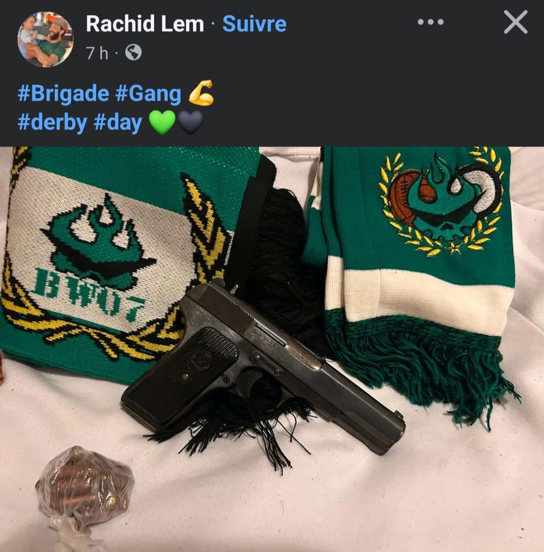 Pistol lying on a white surface between two green-and-white scarves with embroidered logos, and a small plastic bag nearby.