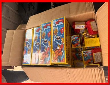 IMG-20260618-WA0256 | MCG24 | موقع إلكتروني مغربي شامل متجدد على مدار الساعة Open cardboard box filled with brightly colored toy boxes featuring cartoon characters.