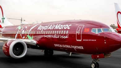 laram | MCG24 | موقع إلكتروني مغربي شامل متجدد على مدار الساعة Royal Air Maroc Boeing 737 MAX 8 on the tarmac with Moroccan flag livery and 'Official Global Partner' text on the fuselage